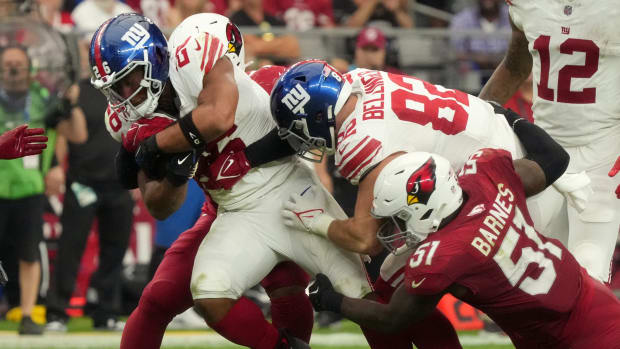 Sep 17, 2023; Glendale, AZ, USA; New York Giants running back Arizona Cardinals (26) runs the ball against the Arizona Cardinals at State Farm Stadium.